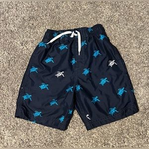 Kanu Surf boys swim trunks, size 4 (small)